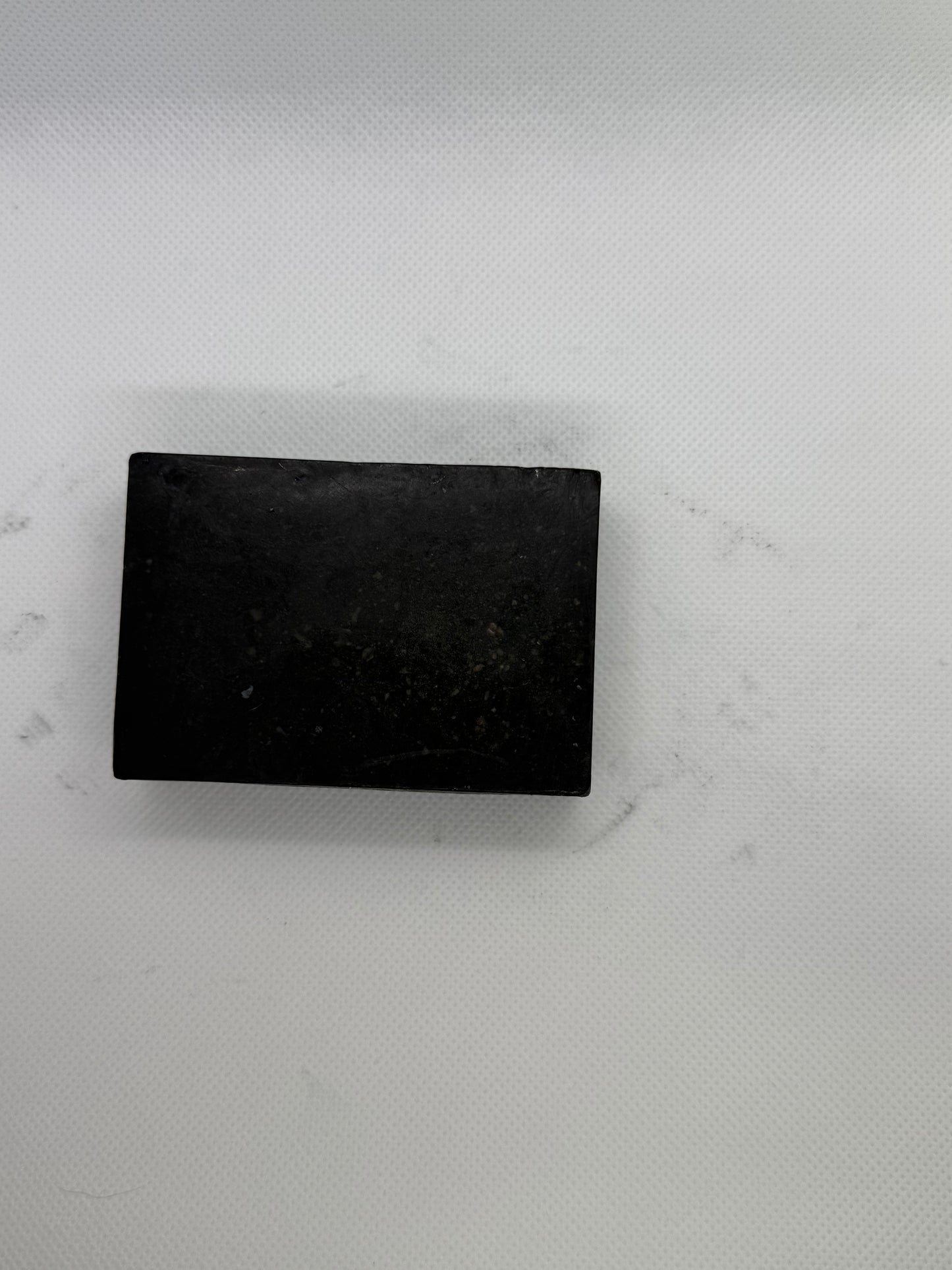 Exfoliating soap bar with a sandalwood scent