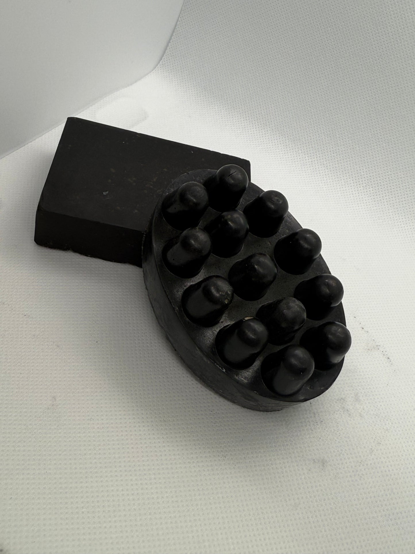 Exfoliating soap bar with a sandalwood scent